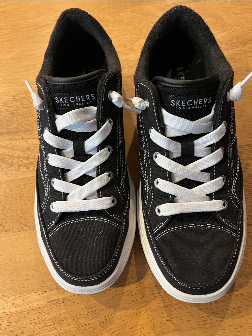 Skechers Black and White Low-Top Canvas Sneakers